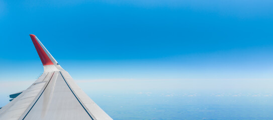 flying and traveling, view from airplane window on wing. picture for add text message or frame...