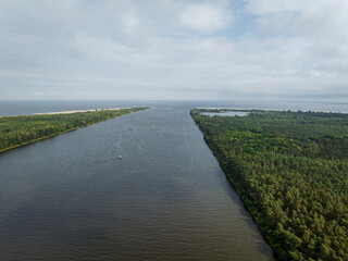 Fototapeta na wymiar Baltic Sea and Vistula Estuary Aerial View. The Bay of Gdańsk at summer time. from above. Baltic Sea, Mikoszewo. Poland. Europe. 