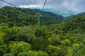 Obraz premium Cable cabs are running on high wire at Bana Hills in Danang, Vietnam. Bana Hills is interesting tourist new places to visit in Da Nang city, Vietnam