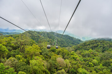 Cable cabs are running on high wire at Bana Hills in Danang, Vietnam. Bana Hills is interesting...