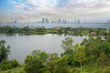 Naklejka premium Ho Xanh (Green Lake) which is a very famous destination for the couples in their wedding in Son Tra, Da Nang province, Vietnam