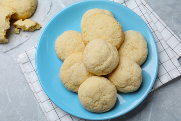 Delicious sugar cookies on light grey marble table, flat lay