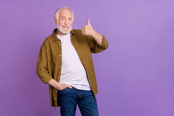 Photo of handsome grandpa grey hair quality approve poster dressed stylish yellow checkered shirt isolated on lilac purple color background