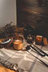Burning candles and accessories for them, atmospheric photo