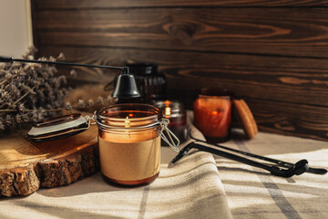Burning candles and accessories for them, atmospheric photo