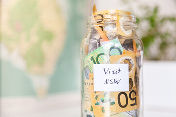 visit NSW - money in a jar for tourist to save up to visit New South Whales