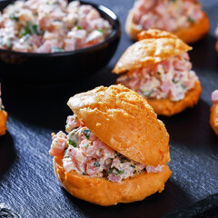 ham salad sandwiched between gougeres, top view