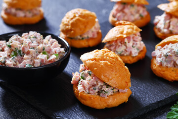 ham salad sandwiched between gougeres, top view