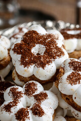 White cookies in flower shape.