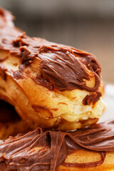 Traditional homemade eclairs on the table.