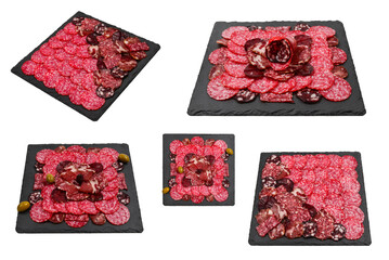 Different kinds of meat cuts on the boards. On a wooden background.