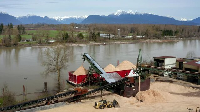 Aerial View Of Sand Loading Barge At Fraser River In Port Kells, Surrey, Canada - drone shot