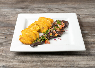 Churrasco with tostones