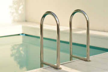 Staircase to private swimming pool, rest and relaxation concept