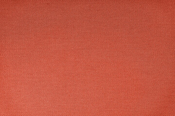 Fototapeta premium Texture of natural red fabric or cloth. Fabric texture diagonal weave of natural cotton or linen textile material. Blue canvas background. Decorative fabric for curtain, furniture, walls, clothes