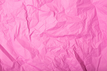 Abstract pink crumpled paper texture