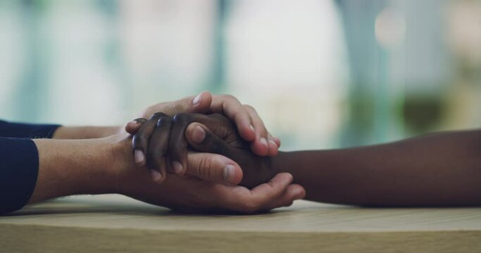 Hands of friends or couple for support, love and empathy in relationship or friendship after loss and grief. Diversity and inclusivity of black woman holding hands for trust, help and solidarity