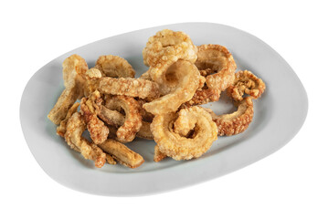 pork scratching or pork crackling on dish