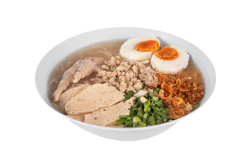 asian style rice noodles soup with herbs in a bowl