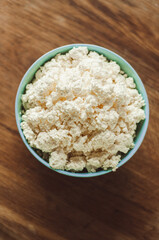 top view bowl with homemade cottage cheese on wooden background proper nutrition diet farm dairy products