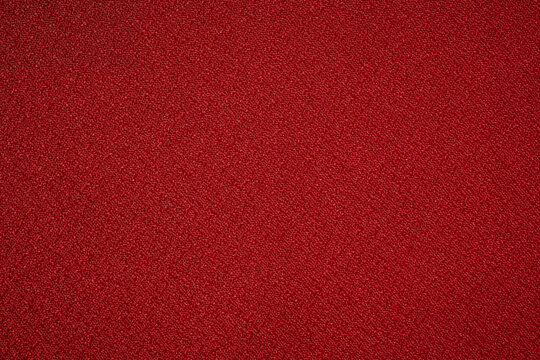 赤い布のテクスチャ　さざら織のクローズアップ
