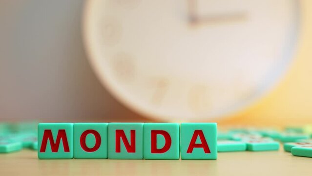 The word MONDAY made of square letters. FIrst day of the week is the hardest for most people. High quality 4k footage