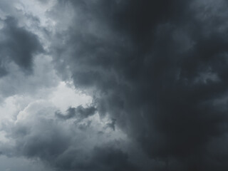The sky is full of dark clouds in bad weather before a thunderstorm.
