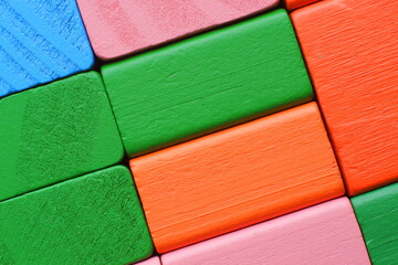 Color blocks. Multicolored wooden cubes. Multicolored blocks. Wooden blocks. Children's constructor. Building material.