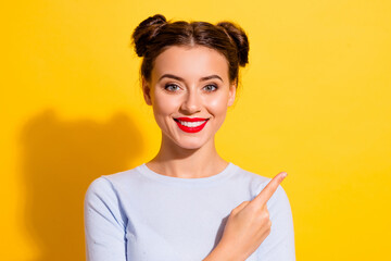 Portrait of positive lady point empty space recommend ads promotion isolated shine color background