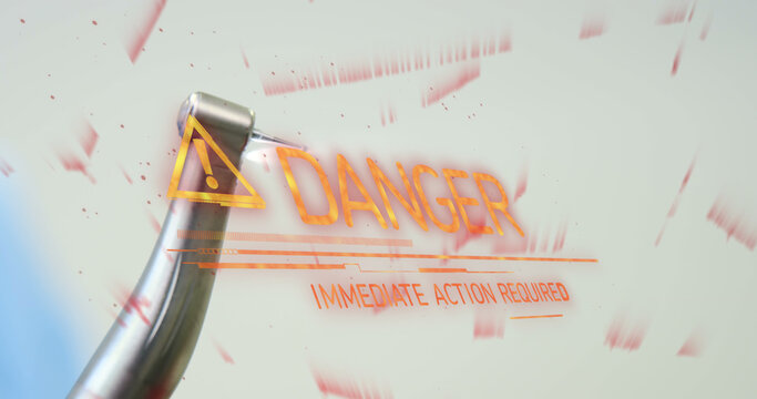 Image of danger text over dental drill - Powered by Adobe
