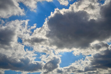 Fototapeta na wymiar Beautiful, dramatic, colorful clouds and blue sky.