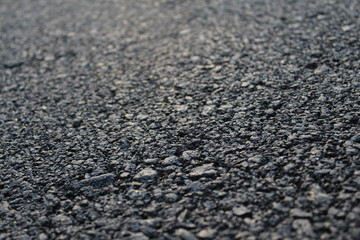 Fresh asphalt in perspective. Selected focus.
