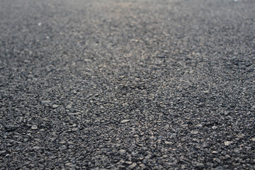 Fresh asphalt in perspective. Selected focus.