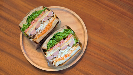 Homemade sausage sandwiches with cheese for breakfast. Top view.