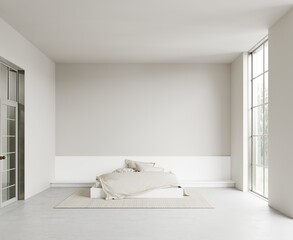 Fototapeta na wymiar Modern white bedroom with a podium bed, concrete floor and wicker rug. White panel behind the bed, light walls. Panoramic floor-to-ceiling windows overlooking the garden.