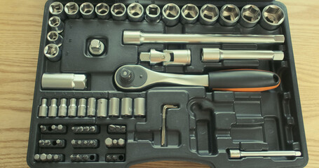 set of tools, takes a ratchet socket wrench. Top view, close-up.