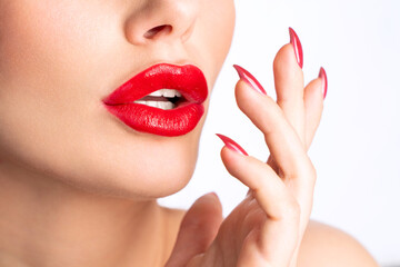 Naklejka premium Close-up Beautiful lips. Sexy plump lips which red lipstick.