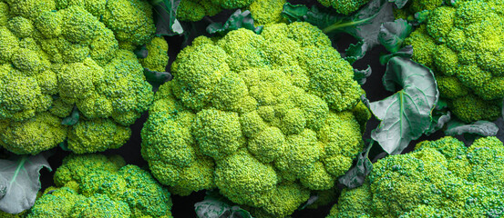 Green broccoli close-up. Healthy, dietary food. Culinary background. Top view