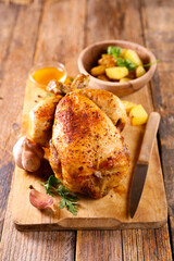 roasted chicken with potatoes and sauce