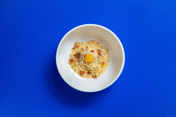 Carbonara with eel and squid in a creamy sauce