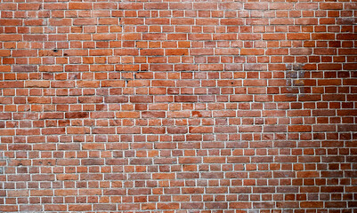 Urban background, long wall by old red brick in London as texture or background