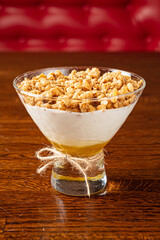 ice cream ice cream with walnuts and honey in a glass bowl