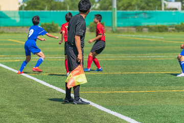 少年サッカー試合風景