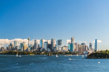 Zelfklevend Fotobehang Beautiful panorama of Sydney city skyline viewed across the harbour from the Taronga Zoo Wharf on a bright day © myphotobank.com.au