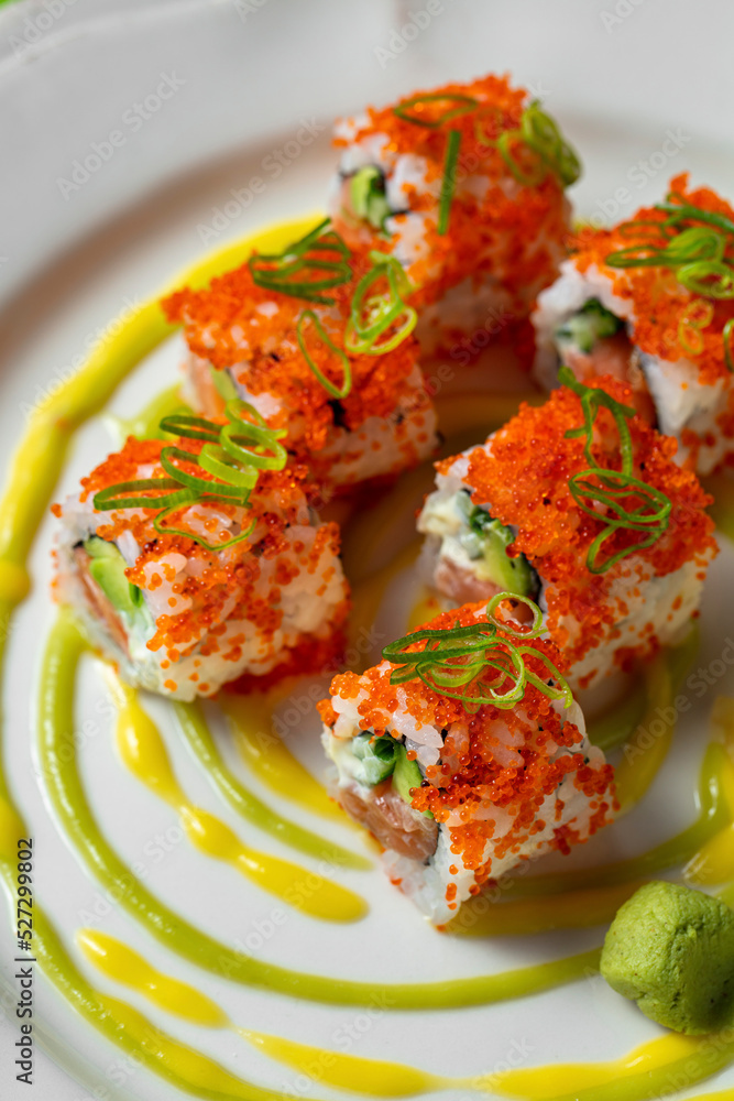 Wall mural Tobiko roll with salmon