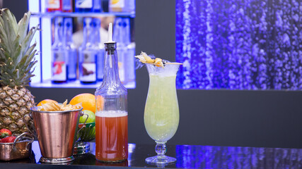 Cocktails with various alcoholic drinks at the bar.
