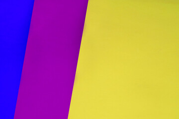 Abstract Background consisting Dark and light shades of blue purple yellow to create a three fold creative cover design