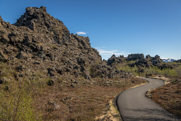 Dimmuborgir Exposure or the Black Fortress, is a dramatic expanse of lava in the Lake Mývatn area. Steeped with folklore, it is one of the most popular destinations for travellers to north Iceland.