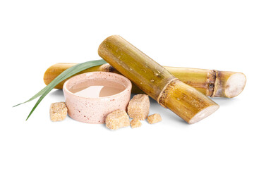 Juice, brown sugar from sugar cane and sugar cane isolated on white background.