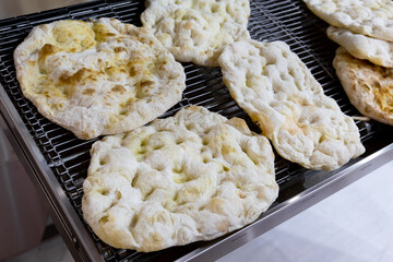 Baked in the oven flat unleavened white bread made of wheat flour